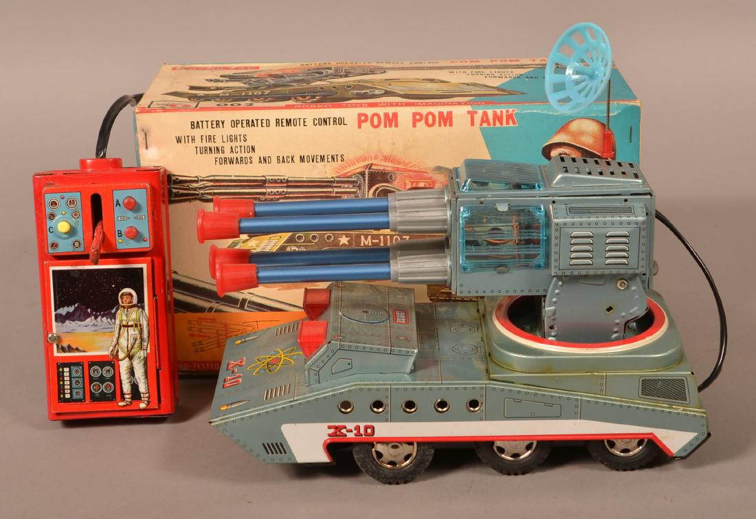 Rosko Battery Operated Pom Pomm Tank.: Rosko Battery Operated Pom Pomm Tank. With original box. 7-1/2"h. Condition: Good with wear, box has damage.