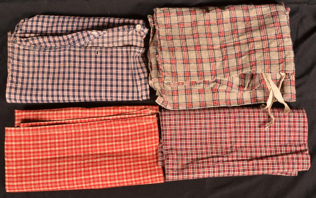 4 Pieces of PA 19th Century Homespun Ticking.: Four Pieces of Pennsylvania 19th Century Homespun Ticking. Largest piece measures 30" x 42". Condition: Good with wear.