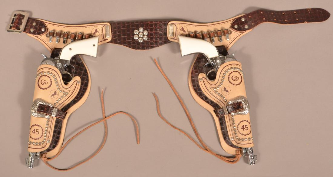 Pair of Hubley Colt 45 Revolvers Holster Set. (1 of 5)