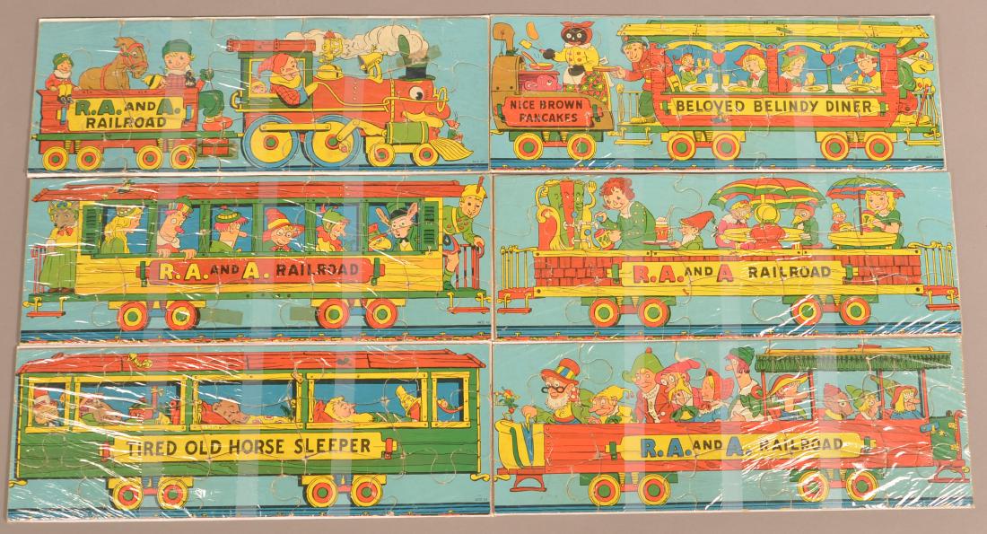 Six R.A. and A. Railroad/Storybook Characters: Six R.A. and A. Railroad/ Storybook Characters Lithograph Cardboard Puzzles. 18"w. Condition: Good with wear.