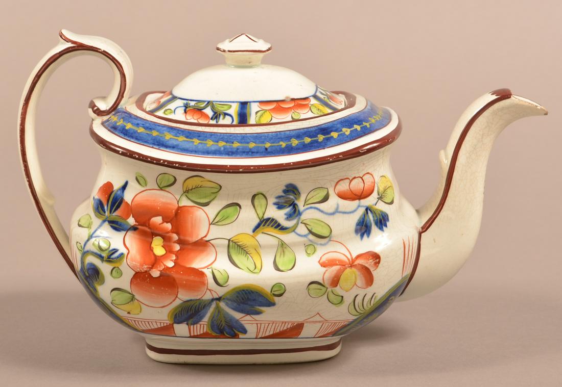 Gaudy Dutch China Single Rose Pattern Teapot.: Gaudy Dutch Single Rose Pattern Soft Paste China Teapot. Green and yellow leaves. 5-1/2"h. Condition: Good with minor chips and a spider line.