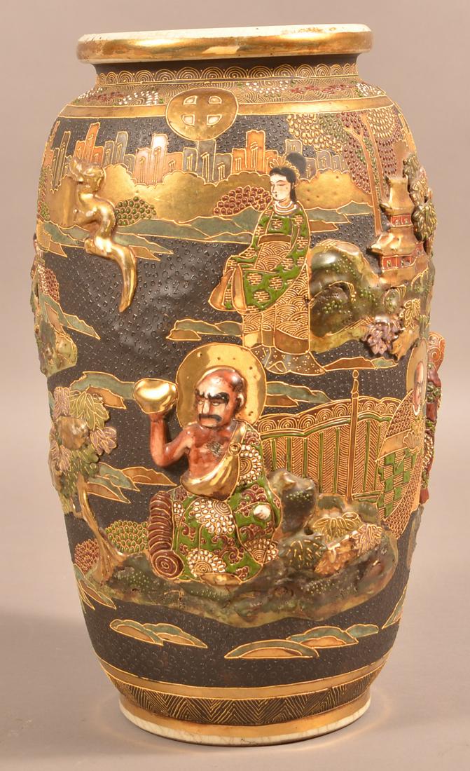 Large Japanese Satsuma Embossed Earthenware Vase.: Large Japanese Satsuma Embossed Earthenware Vase. Gilt and polychrome enamel decorated with figures and village scenes and landscapes. 16-1/2"h. Condition: Good with minor wear.