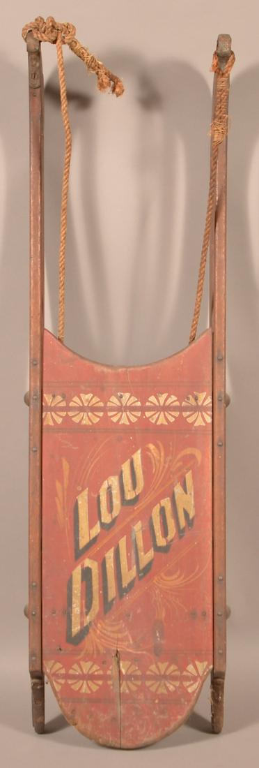 Antique Paint Decorated Wood Child's Sled.: Antique Paint-Decorated Wood Child's Sled. Signed "Lou Dillon" (Name of a 19th century sulky horse). Red ground with iron runners. 39"l. Condition: Good with wear and minor loss, some cracks.