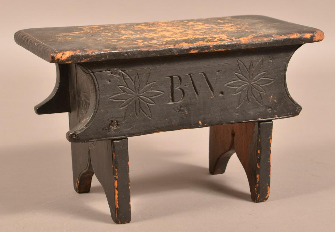 Pennsylvania 19th Century Carved Softwood Stool.: Pennsylvania 19th Century Carved Softwood Stool. Initialed "B.W." and carved with floral pinwheels/hex signs. 7-1/2"h. x 12"w. x 6-1/2"d. Condition: Good with wear and paint loss.