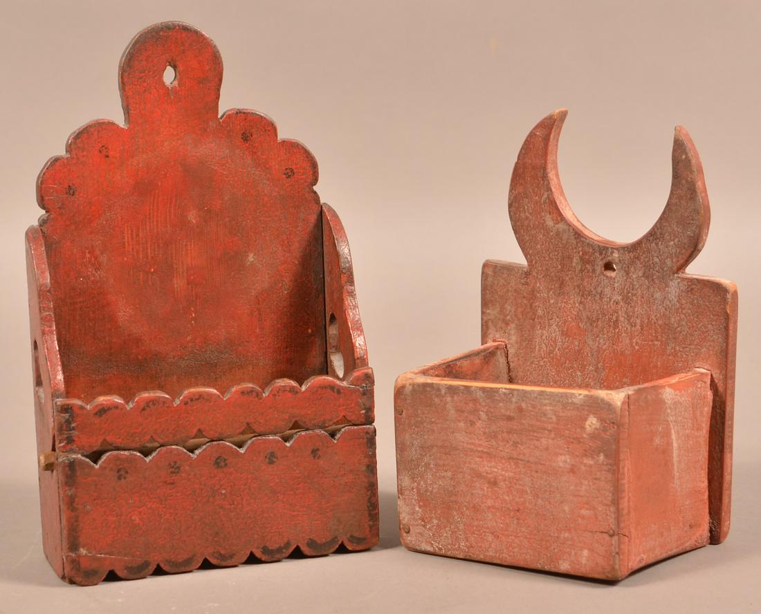 Two Antique Red Painted wood Wall Boxes.: Two Antique Red-Painted Wood Wall Boxes. Salt box with crescent cut-out, 8-1/4"h. and a wall box with scalloped cut-outs and interior roller bar, 10"h. Condition: Good with wear.