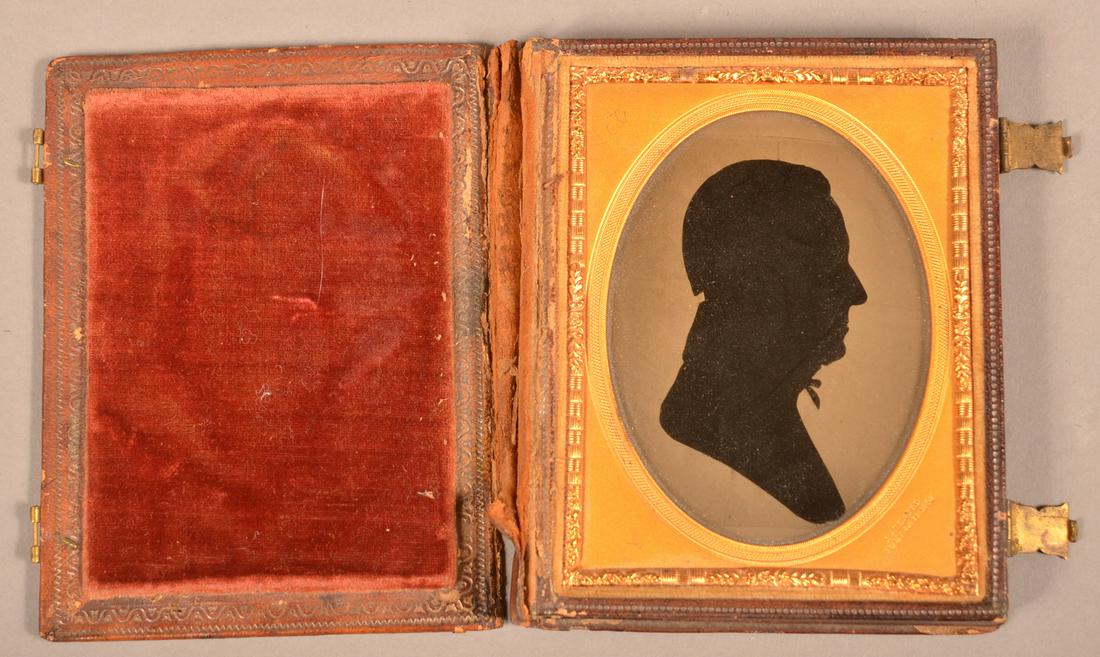 Antique American Silhouette in Leather Case.: Antique American Silhouette in Leather Case. A silhouette of a gentleman purported to be James Hansell of Philadelphia, in a leather bound case with a patent date of July 1854 and diminutive brass loc