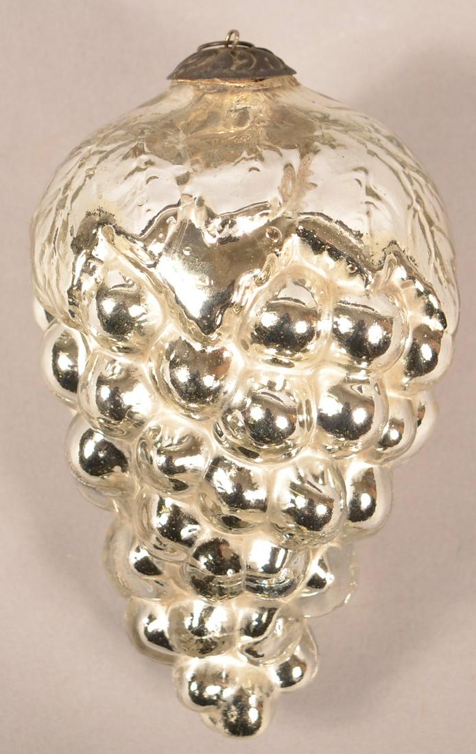 French Silver Glass Oval Leaf Cluster of Grapes Kugel.: Antique French Silver Glass Oval Leaf Cluster of Grapes Kugel. Baroque cap. Pictured in "Kugels: An Antique Christmas Obsession" by Joseph Krisky. 6"h. Condition: Very good.