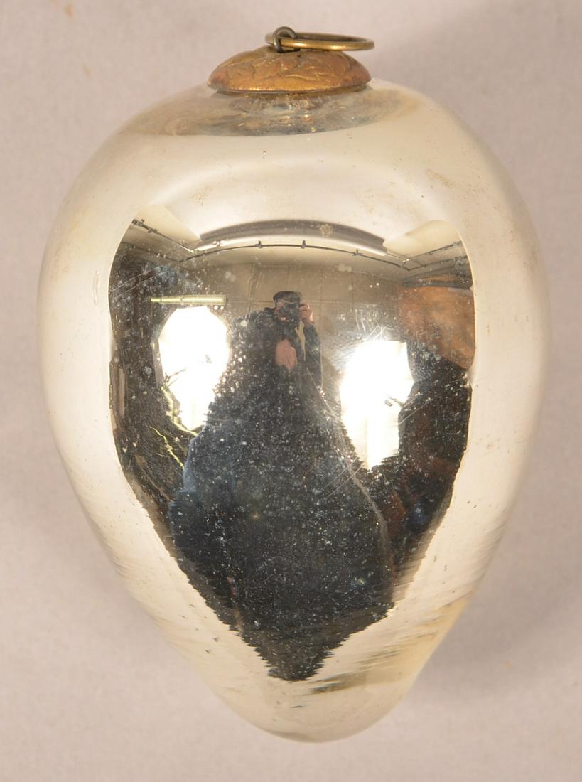 Antique German Silver Glass Egg Form Kugel.: Antique German Silver Glass Egg Form Kugel. 5 leaf cap. 4-1/2"l. Condition: Very good.