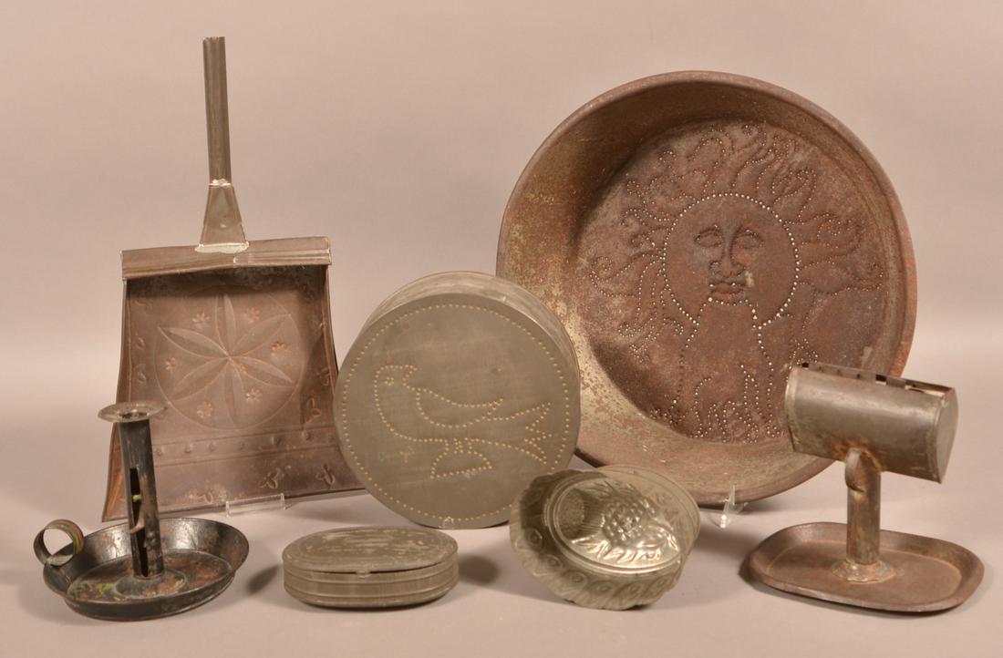 Lot of Antique Tin Items.: Lot of Antique Tin Items. Including a miniature cookie cutter set in oval case, various lighting, punch decorated dust pan etc. Condition: Fair to good with rust, pitting and wear.