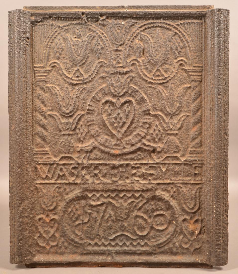 Cast Iron God's Well Stove Plate, Dated 1760.: Cast Iron God's Well Stove Plate, Dated 1760. For a similar example, see "The Bible in Iron" by Henry Mercer, figure 171. 24'' h., 20'' w. Condition: Very good with pitting and rust.