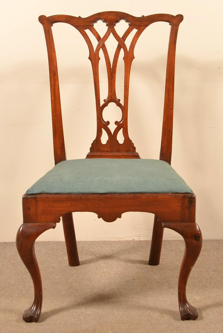 Pennsylvania Queen Anne Walnut Sidechair.: Pennsylvania Queen Anne Walnut Sidechair. Serpentine crest rail, pierced Gothic splat back, upholstered slip seat, shaped skirt, cabriole legs with Trifid feet. Owners note: This chair may have been m