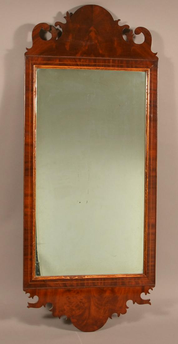 American Chippendale/Hepplewhite Transitional Mirror.: American Chippendale/Hepplewhite Transitional Mirror. Circa. 1790. Mahogany with banded inlay and scroll cut-outs. 47" x 19". Condition: Very good.