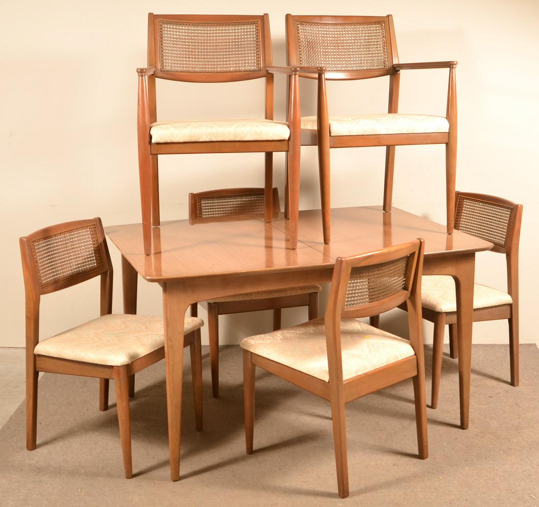 Mid-Century Modern Nine Piece Dining Room Suite.: Mid-Century Modern Maple Nine Piece Dining Room Suite. Made by Century Furniture Co., Hickory, NC. Table with two extension boards and pads, six upholstered seat cane-back chairs, china cabinet and se
