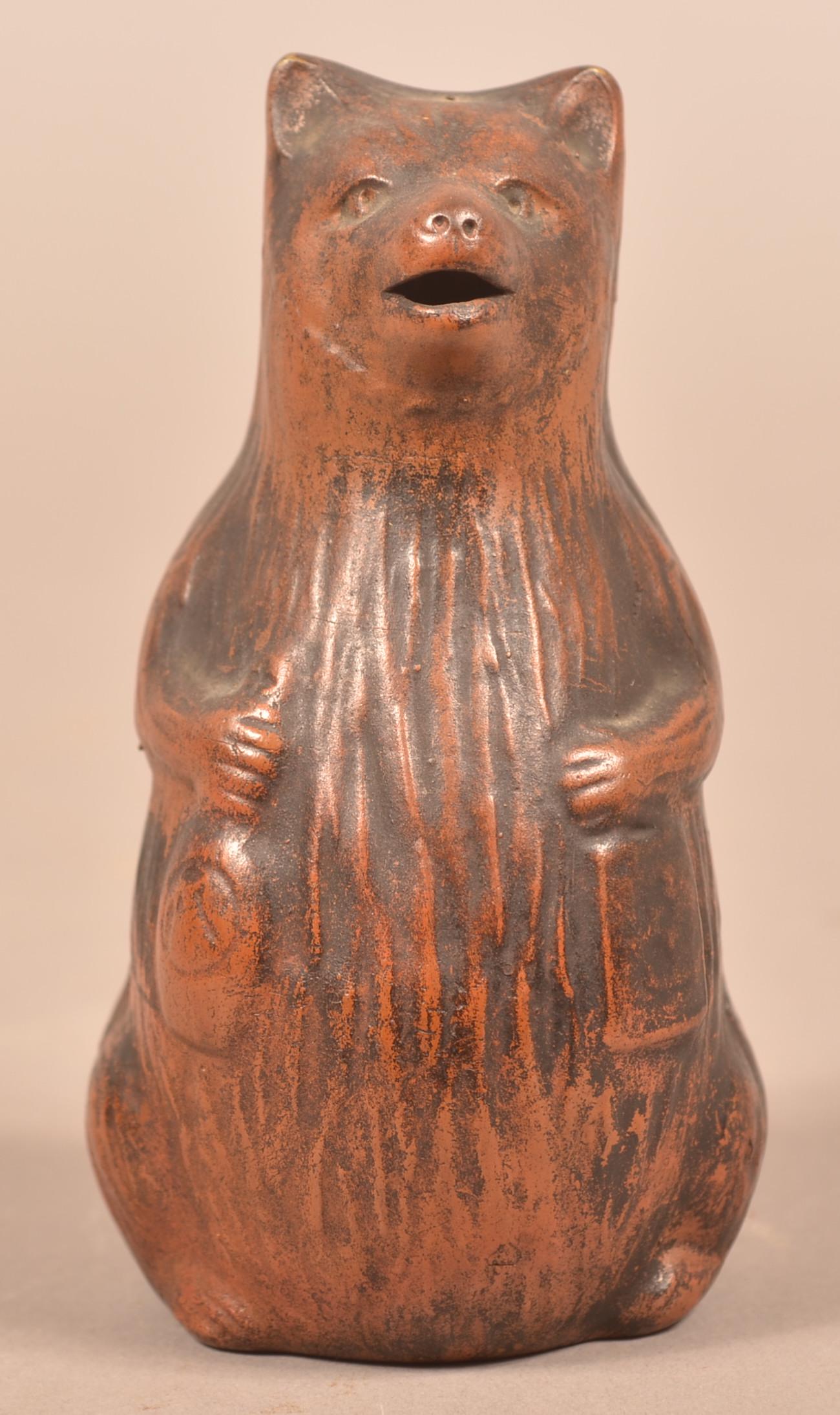 Antique Molded Redware Bear Form Cream Pitcher.: Antique Molded Redware Bear Form Cream Pitcher. 5-1/2"h. Condition: Very good.