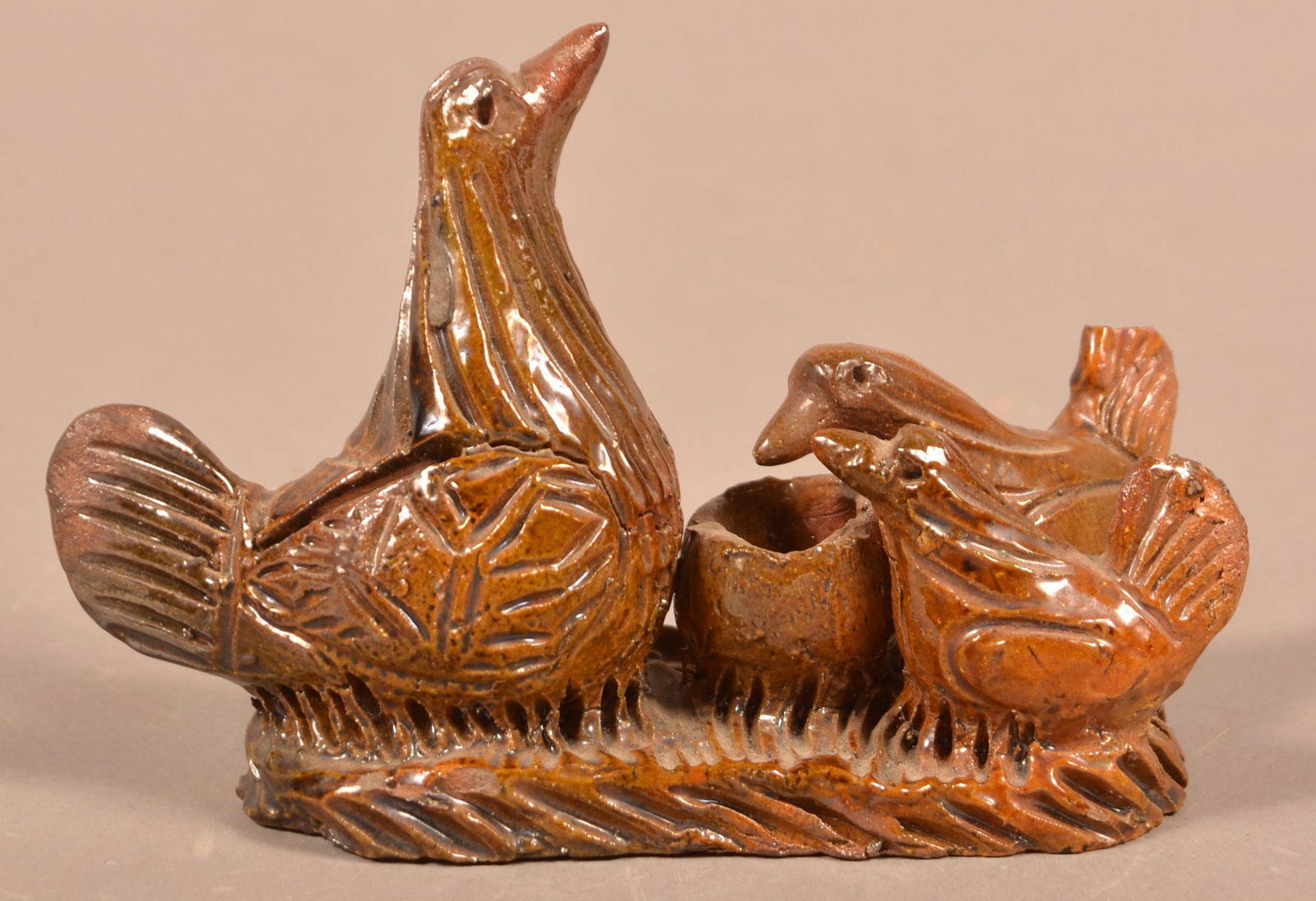 Rare PA Redware Pottery Bird Figural Group Still Bank.: Rare Pennsylvania 19th Century Redware Pottery Bird Figural Group Still Bank. Hand molded slab base with Mother bird and two fledglings. 4-1/2"h. x 6-1/2"l. x 2-3/4"w. Condition: Good with chips and l
