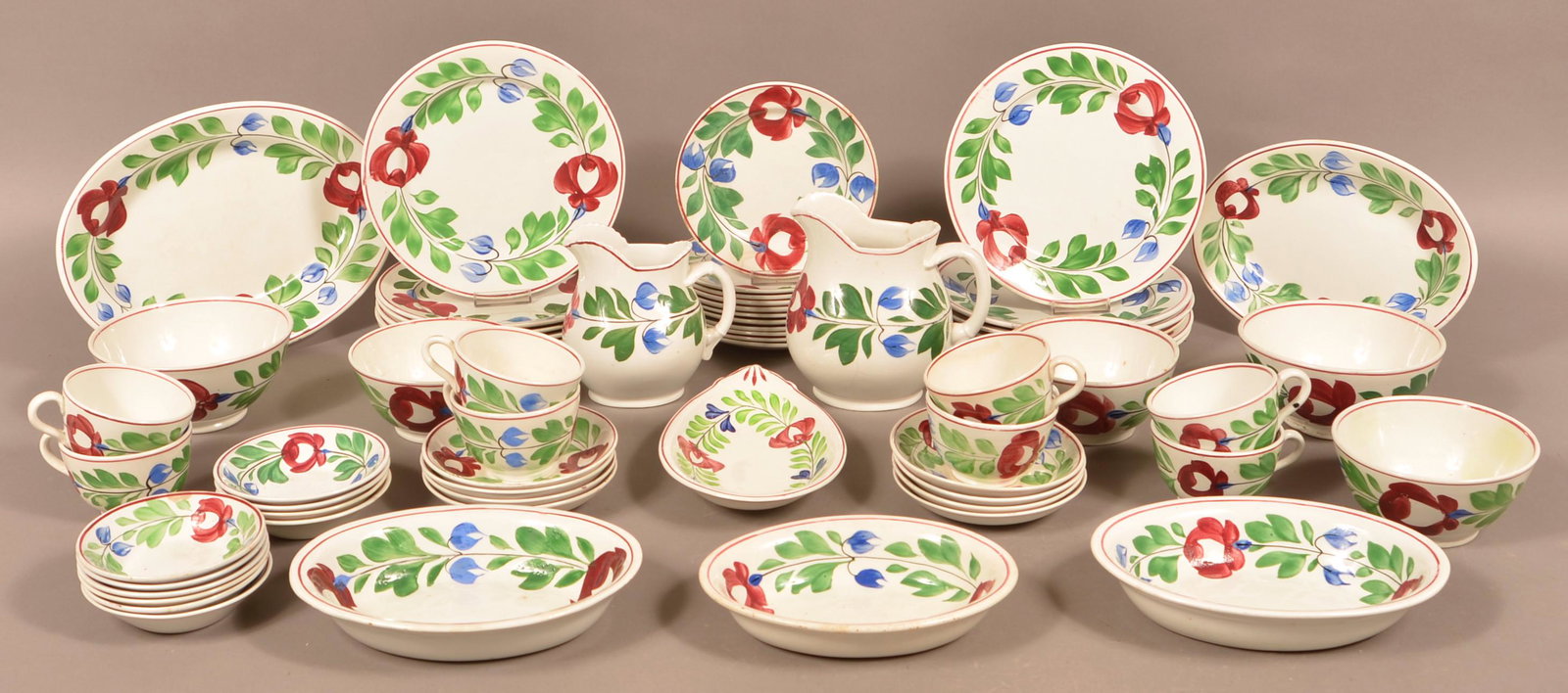 62 Pieces of Late Adams Rose ironstone China.: 62 Pieces of Late Adams Rose Ironstone China. Including pitchers, platters, plates, bowls, cups and saucers. Condition: Very good with minor damage.