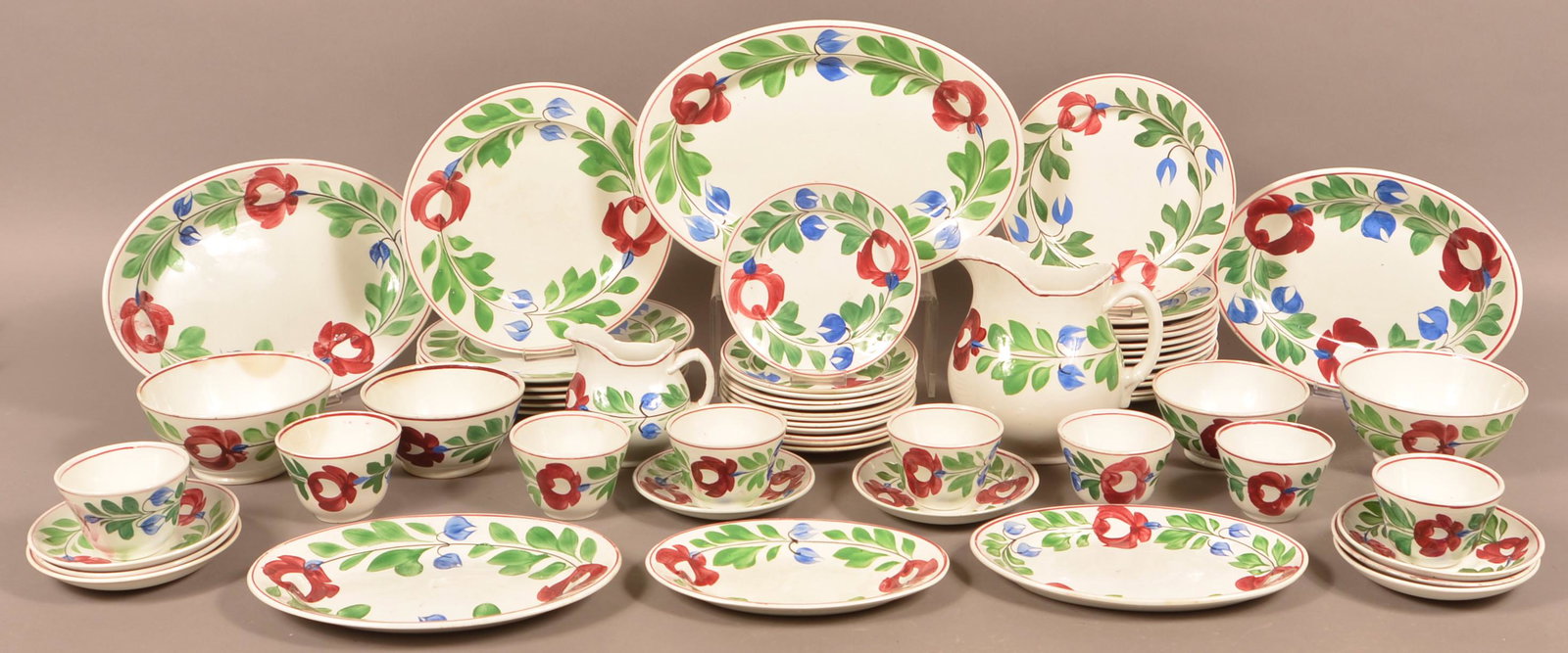 57 Pieces of Late Adams Rose ironstone China.: 57 Pieces of Late Adams Rose Ironstone China. Including pitchers, platters, plates, bowls, cups and saucers. Condition: Very good with minor damage.