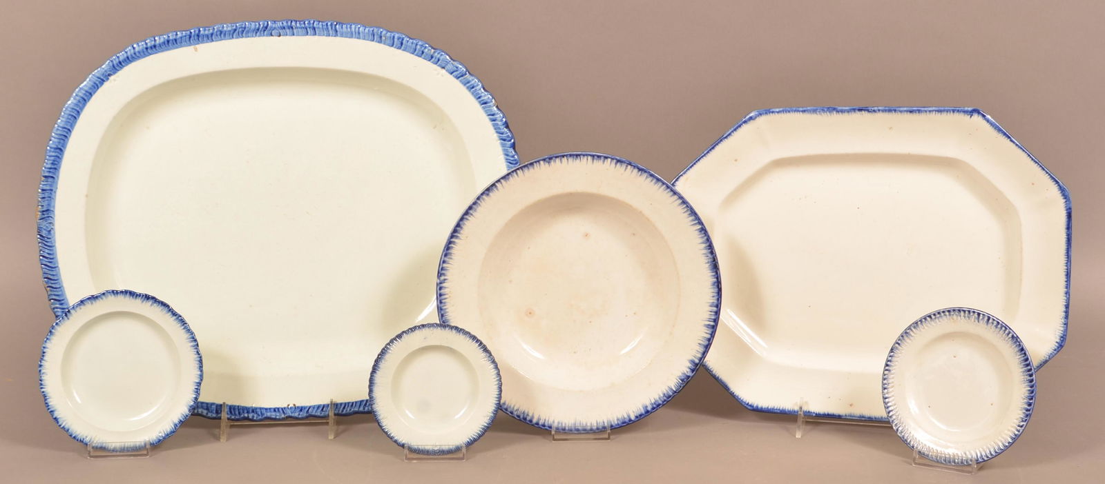 Six Pieces of Leeds Soft Paste Blue Feather Edge China.: Six Pieces of Leeds Soft Paste Blue Feather Edge China. Two platters and four plates. Platter measures 16-3/4"w. Condition: Very good with tiny edge chips.