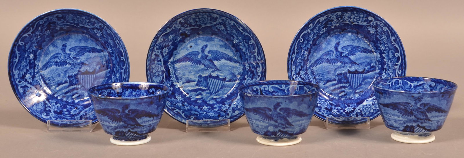3 Staffordshire Blue Transfer China Cups & Saucers.: Three Historical Staffordshire Blue Transfer China Cups and Saucers. Boston Harbor with Spread Wing Eagle and Shield. By Rogers. Saucers measure 5-1/2" diam. Condition: Very good.