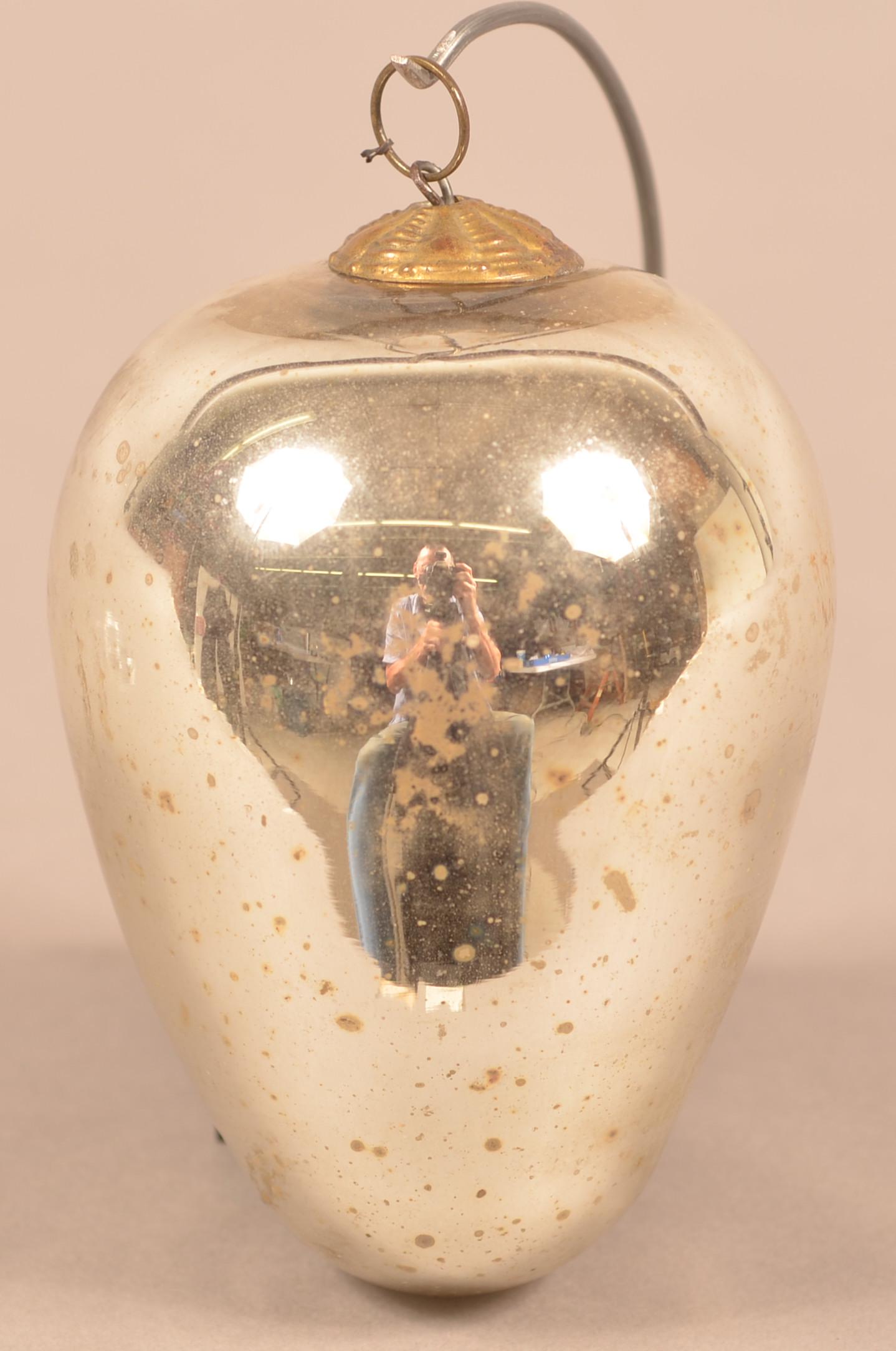 Antique German Silver Glass Egg Form Kugel.: Antique German Silver Glass Egg Form Kugel. 10 Lobed cap. 4-1/2"l. Condition: Good.