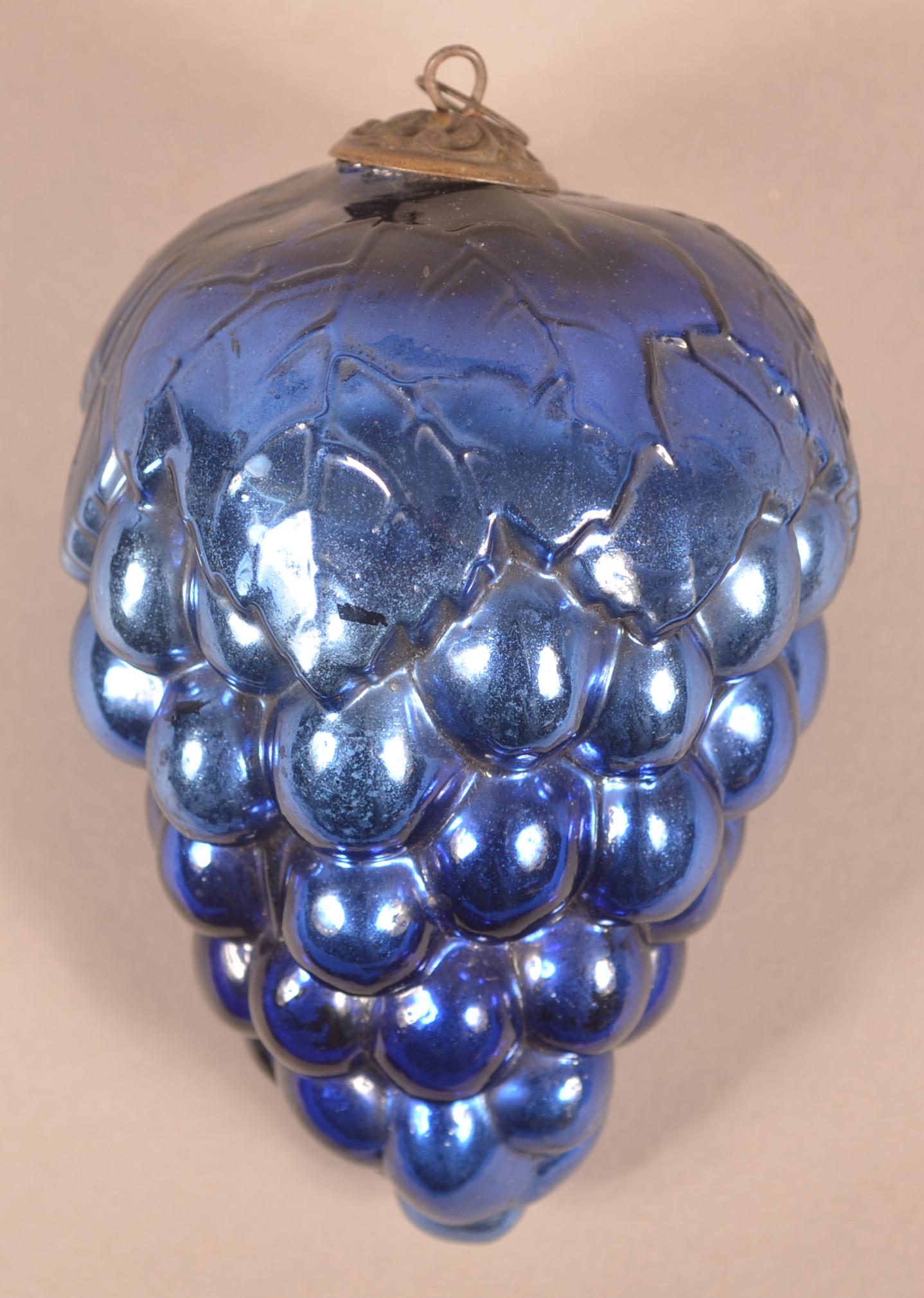 Antique French Cobalt Glass Cluster of Grapes Kugel.: Antique French Cobalt Glass Oval Leaf Cluster of Grapes Kugel. Embossed "Depose" on top. (French registry mark). Baroque cap. Ex. Harry Hartman. 5"l. Condition: Very good.