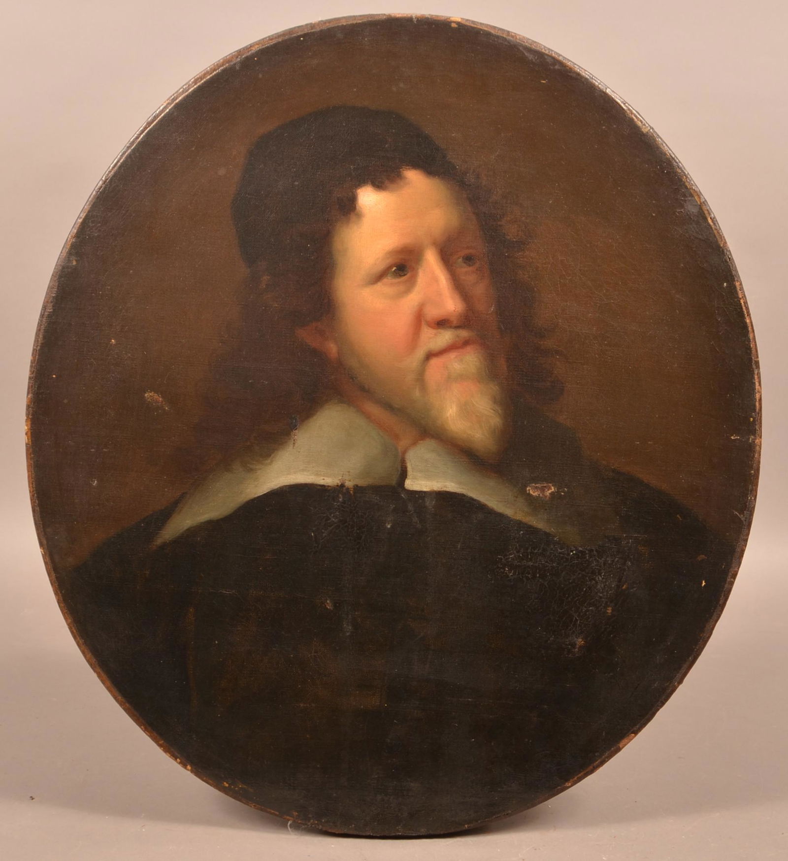 18th Century Dutch School Portrait of a Nobleman.: 18th Century Dutch School Portrait of a Nobleman. Unsigned oval oil on canvas. Unframed, 24-3/4" x 22". Condition: Fair with old repairs, cut and mounted onto a backing canvas.