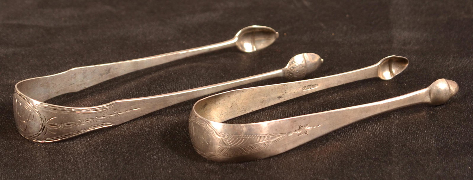 Two Pair of American Coin Silver Sugar Tongs.: Two Pair of American 18th/19th Century Coin Silver Sugar Tongs. Acorn ends with bright-cut decoration. William Ball, Baltimore, MD Circa. 1790-1815 and W.G. Forbes, New York, NY Circa. 1773-1796. Mono