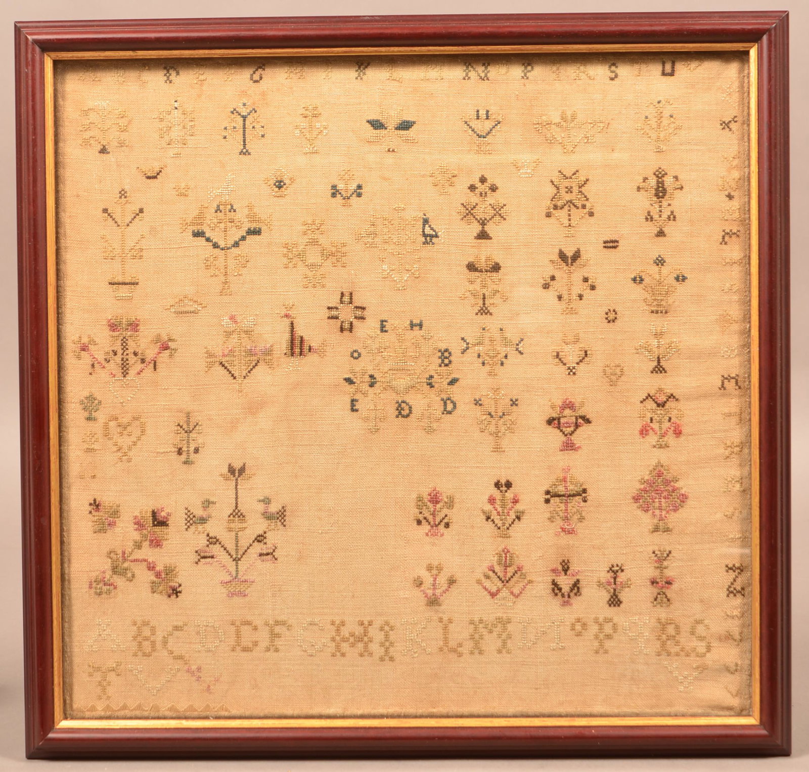 Pennsylvania Cross Stitch Alphabet Sampler Dated 1777.: Pennsylvania Cross Stitch Alphabet Sampler. "Elisabet Resin 1777". Rowed type with potted flowers and birds. In a later frame, 15-1/2" x 16" overall. Condition: Good with wear and stains.