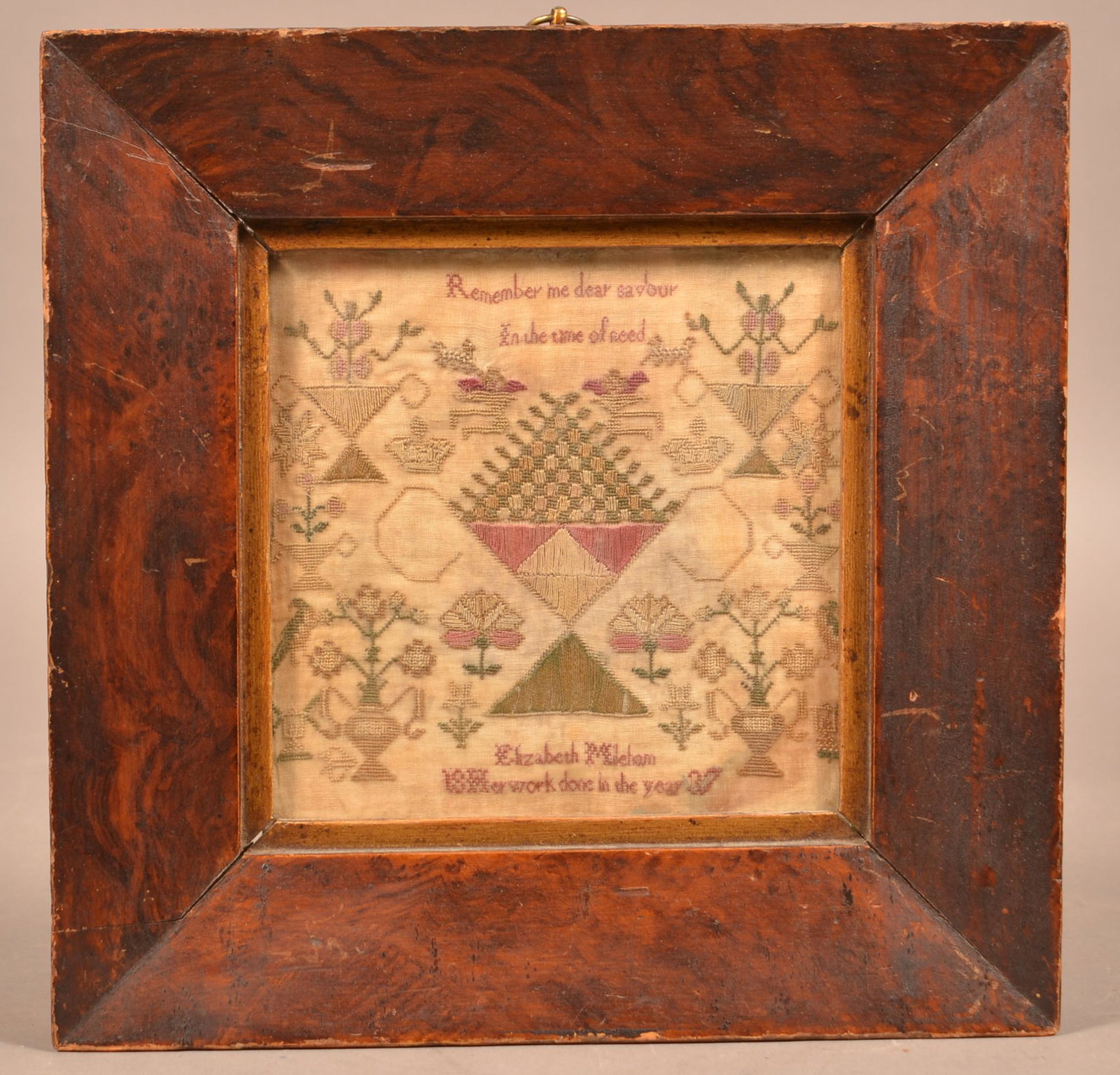 Small 1837 Needlework Mirror Image Sampler.: Small 1837 Needlework Mirror Image Sampler. Elizabeth Mileham 1837. With angels, birds, crowns and potted flowers. In a great grain-paint decorated mitered frame, 10-1/2" square overall. Condition: Go