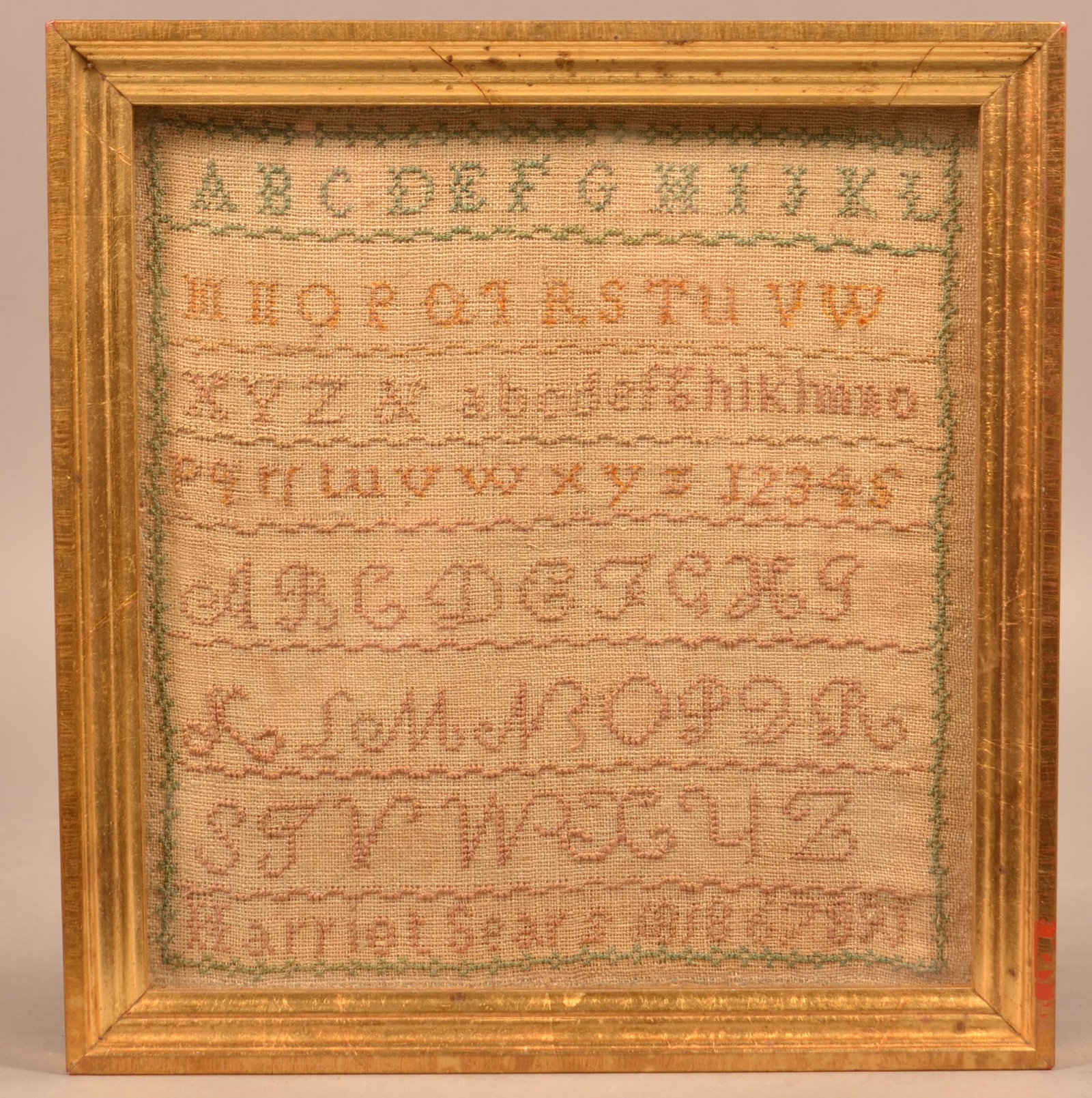 Pennsylvania Cross Stitch Alphabet Sampler dated 1818.: Pennsylvania Cross Stitch Alphabet Sampler. "Harriot Sears 1818". Rowed type with letters and numbers. In a later gilt molded frame, 10-1/2" x 10" overall. Condition: Good with toning.