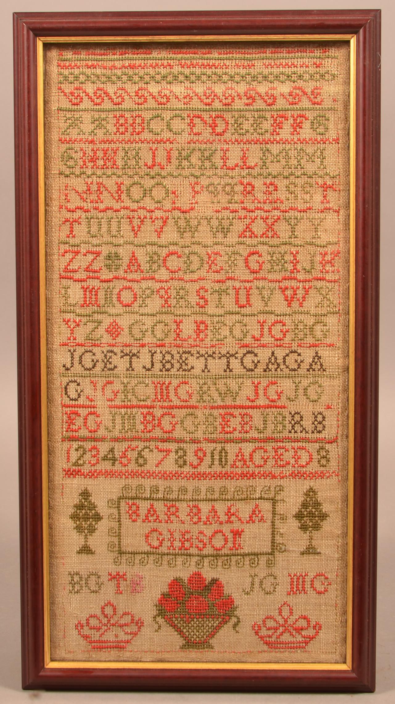 19th Century Cross Stitch Alphabet Sampler.: 19th Century Cross Stitch Alphabet Sampler. "Barbara Gibson Aged 8". Rowed type with letters and numbers. In a later molded frame, 18-3/4" x 10" overall. Condition: Good with toning and wear.