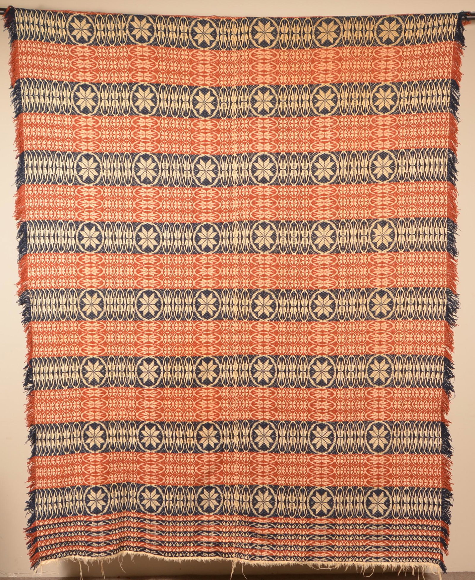 Antique Four Color Two Part Woven Jacquard Coverlet.: Mid 19th Century Four-Color Two-Part Woven Jacquard Coverlet. Unsigned. With alternating colors and patterns. 71" x 92" not including fringe. Condition: Very good.