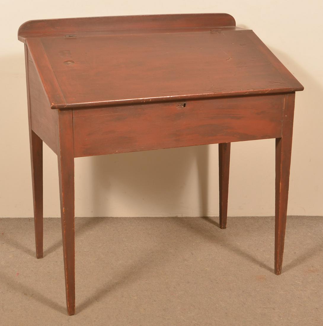 PA Country Hepplewhite Softwood Schoolmaster's Desk.: Pennsylvania Country Hepplewhite Red-Painted Softwood Schoolmaster's Desk. Slant-lid with interior drawers and compartments, deep skirt with tapered legs. 40"h. x 38"w. x 22"d. Condition: Good with we