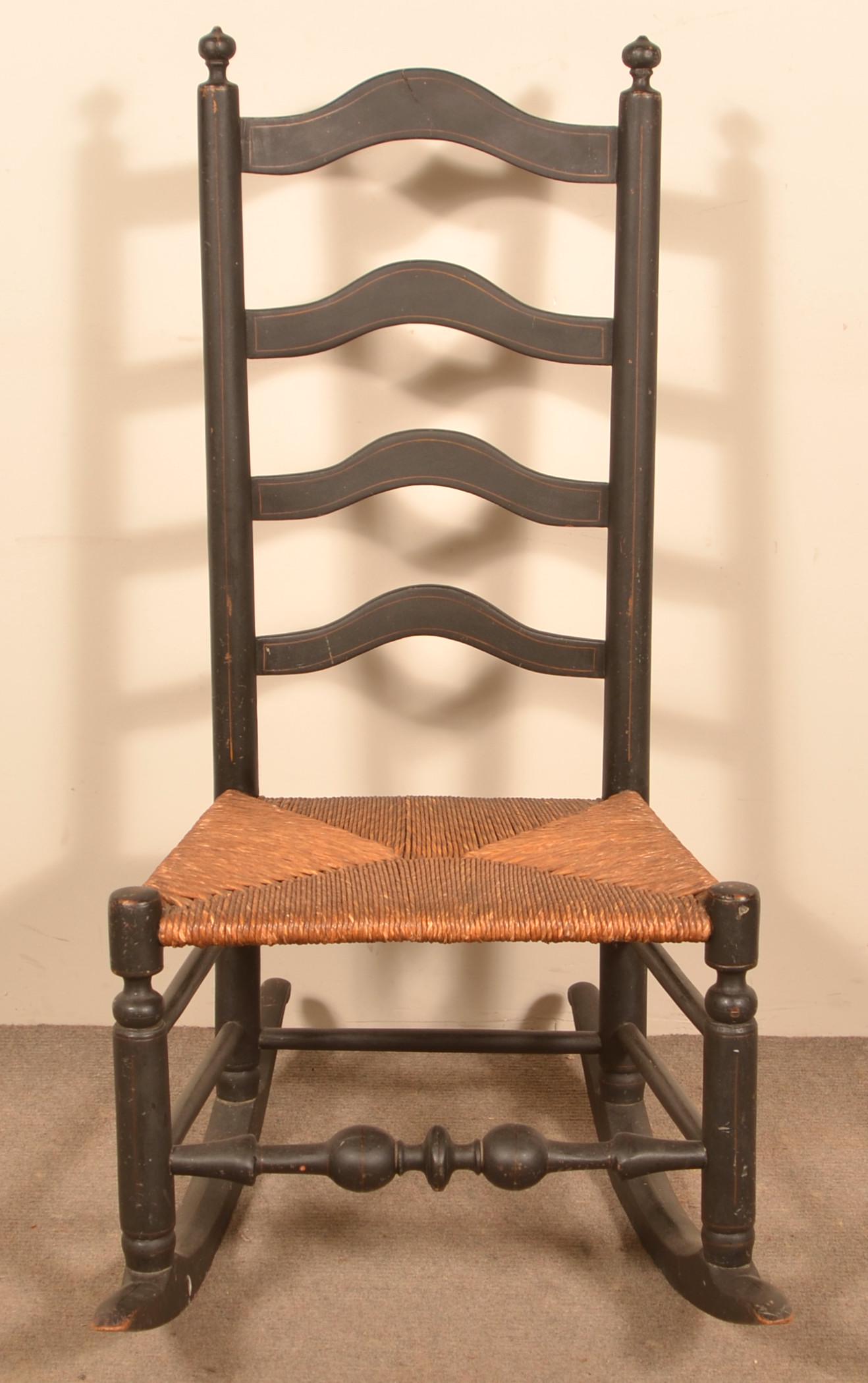 Delaware Valley Four Slat Ladderback Rocking Chair.: Delaware Valley Four Slat Ladderback Rocking Chair. Circa. 1800, rush seat, retaining an old painted surface. Seat height 16", 31"h. overall. Condition: Good with wear. Top slat has a crack (does not 