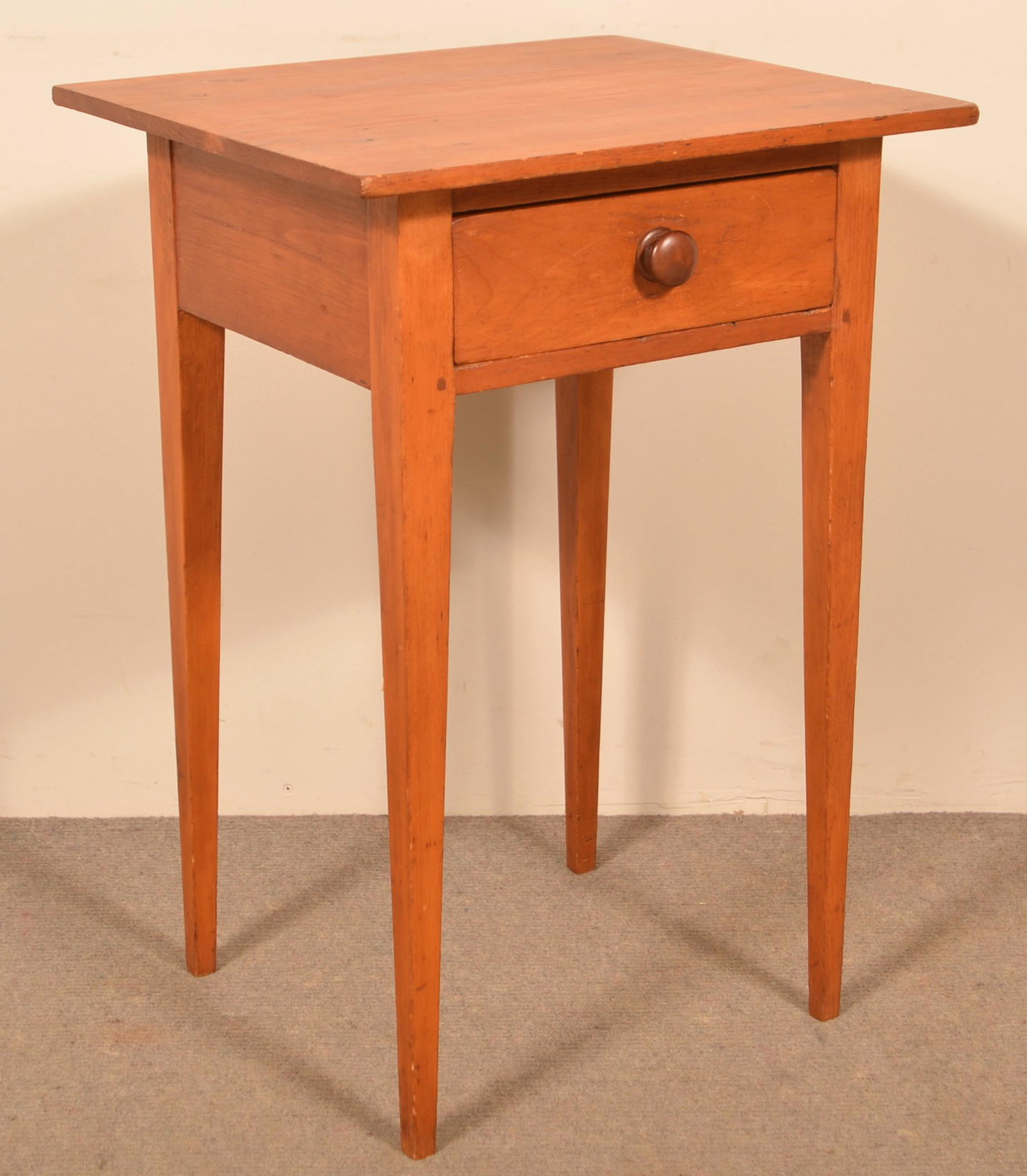 Pennsylvania Country Hepplewhite Softwood Stand.: Pennsylvania Country Hepplewhite Softwood Stand. Rectangular top, dovetailed skirt drawer and tapered legs. 29"h. x 20"w. x 17-1/2"d. Condition: Good with wear. Refinished.