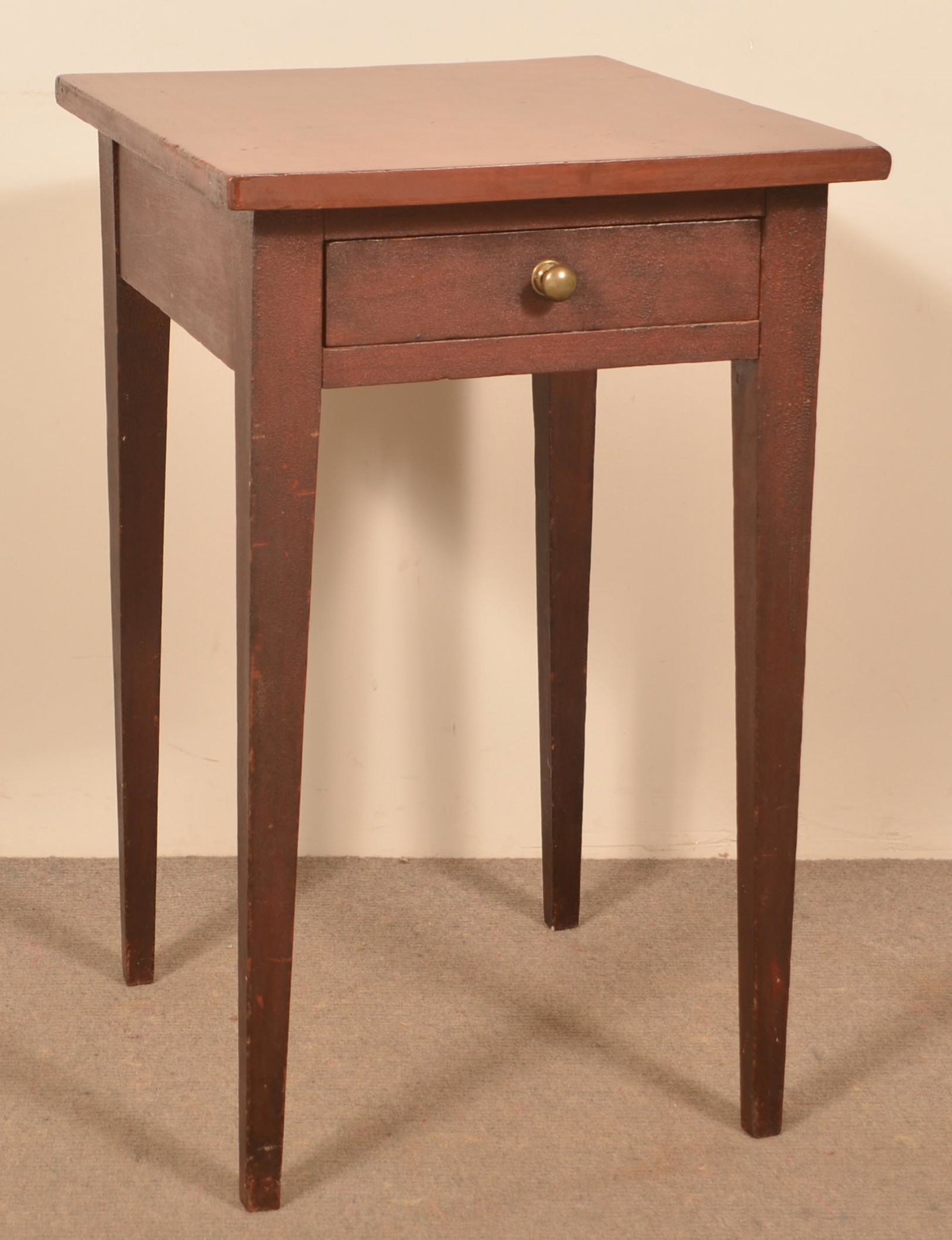 Pennsylvania Country Hepplewhite Cherry Stand.: Pennsylvania Country Hepplewhite Cherry Stand. Rectangular top, dovetailed skirt drawer and tapered legs. 31"h. x 18-1/4"w. x 21"d. Condition: Good with wear.