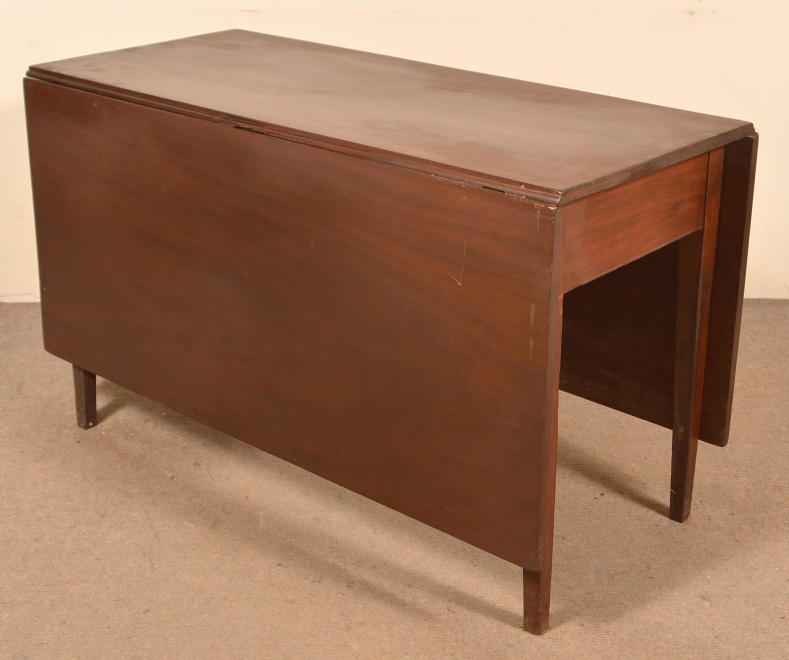 American Hepplewhite Walnut Drop-Leaf Table.: American Hepplewhite Walnut Drop-Leaf Table. 29" h. x 48" l. x 21-1/2" w., leaves measure 22". Condition: Good with wear and age cracks. Repair to top.