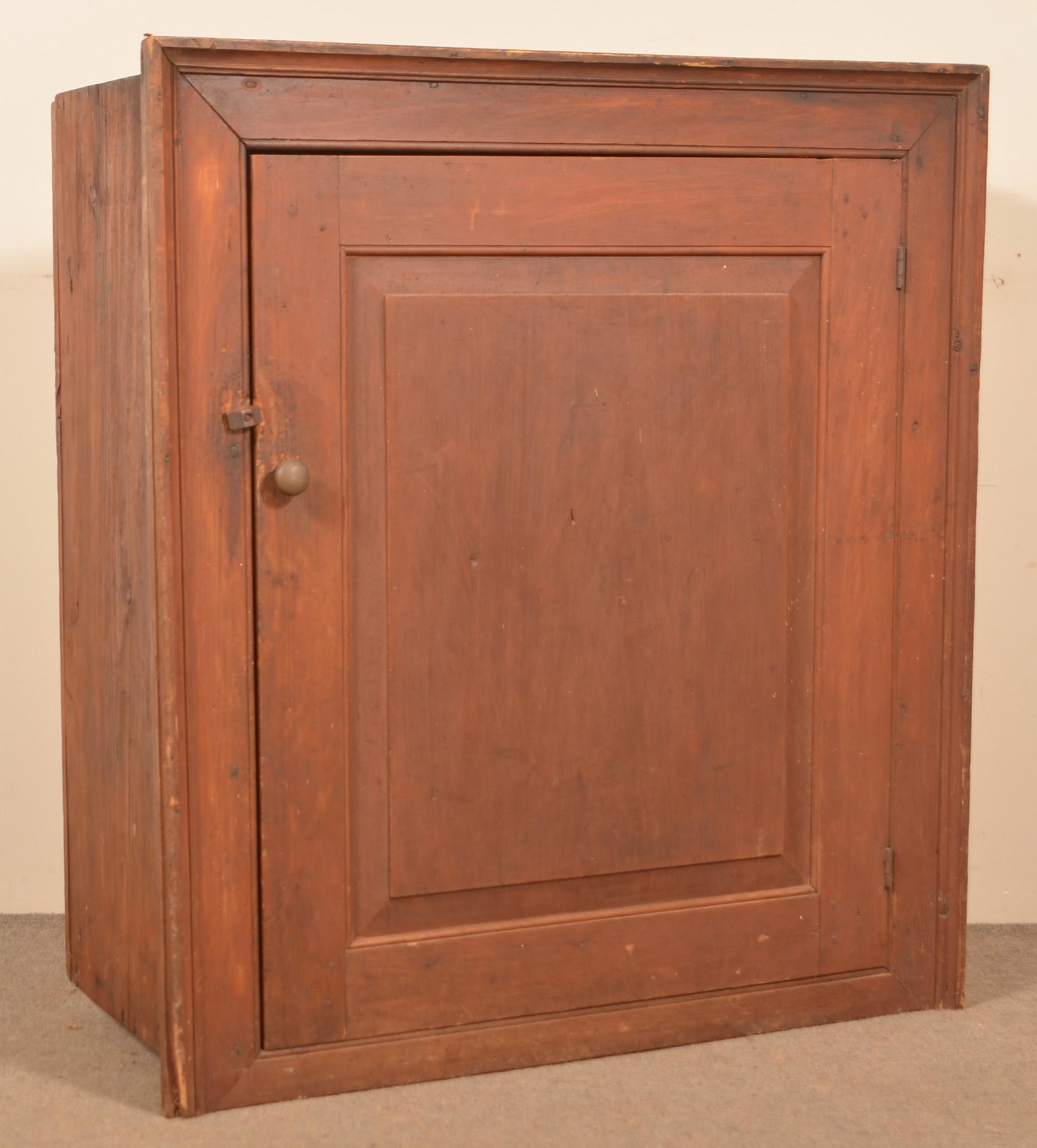 PA Late 18th Century Cherry Built-In Wall Cupboard.: Pennsylvania Late 18th Century Cherry Built-In Wall Cupboard. Original red finish. Molded frame with raised panel door and fixed interior shelves. 36-1/2"h. x 33"w. x 13"d. Condition: Good with wear.