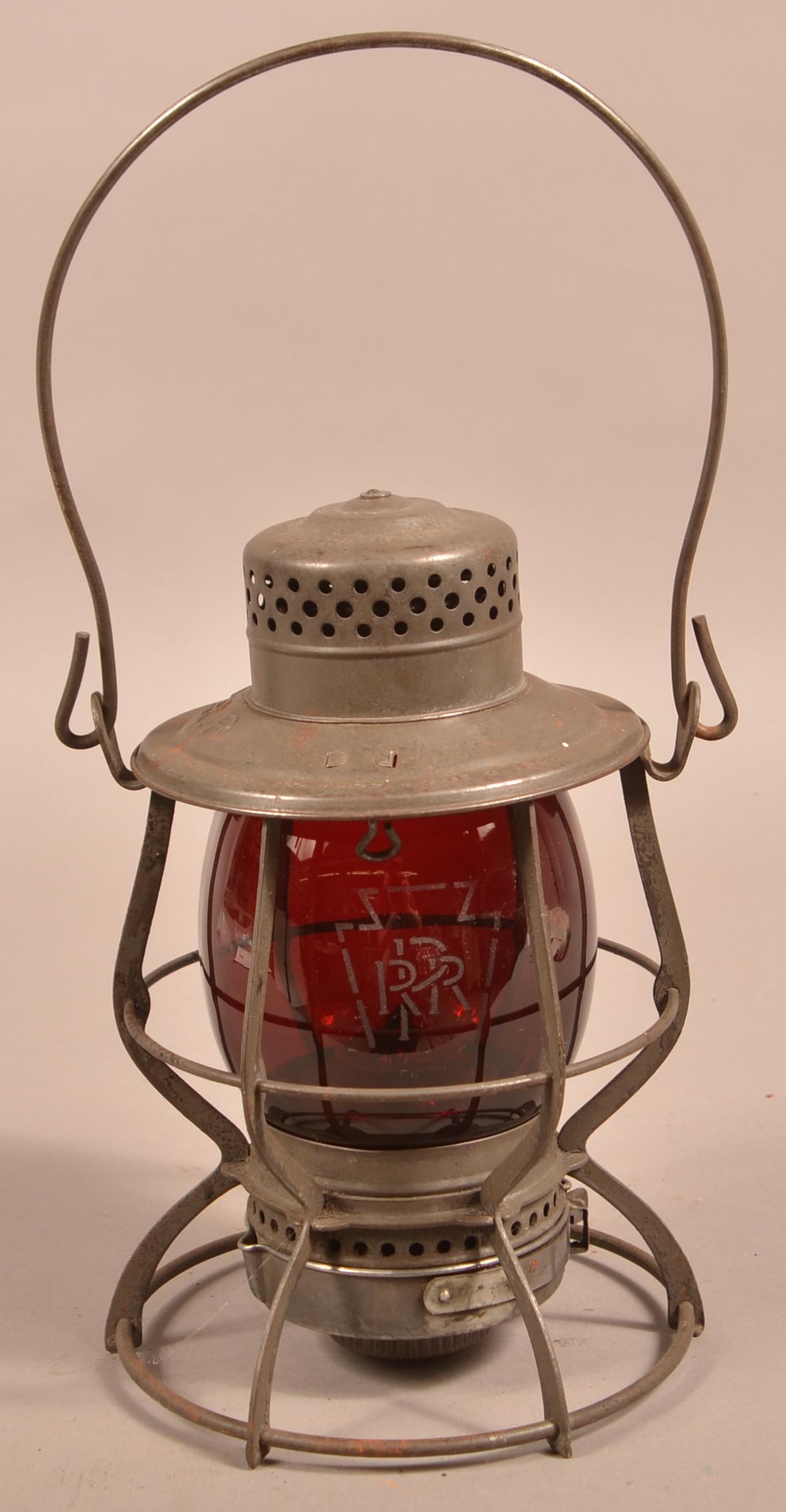 Antique Keystone PRR Red Glass Globe Lantern.: Antique Keystone PRR Red Glass Globe Lantern. Globe is etched with PRR in keystone logo. 10-1/4"h. not including handle. Condition: Good with use wear, chips on shade.