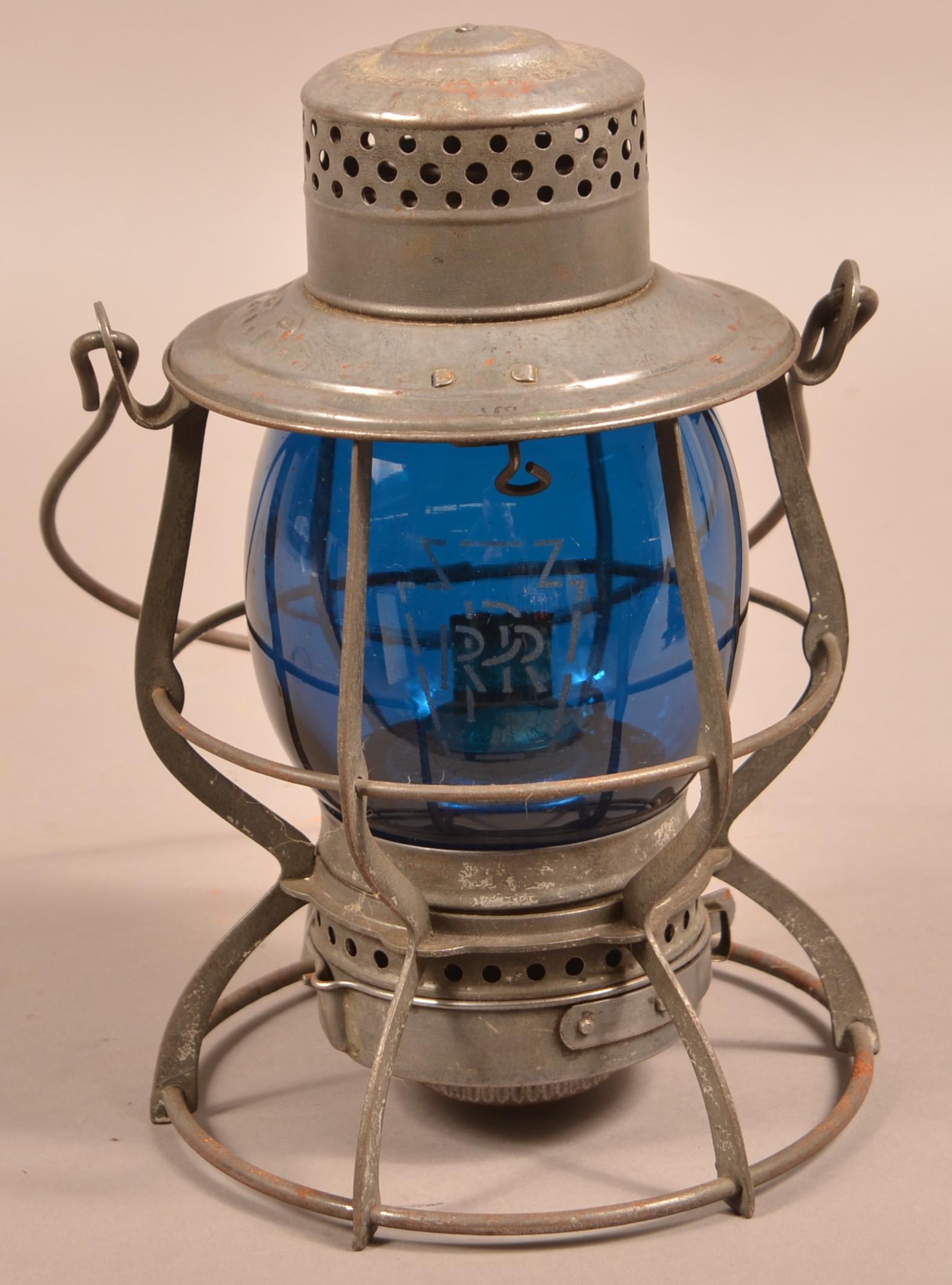 Antique/Vintage Keystone Penn. Railroad Lantern.: Antique/Vintage Keystone Pennsylvania Railroad Lantern. Blue glass etched globe. 10-1/4"h. not including handle. Condition: Good with overall light rust. Globe has a BB hit.