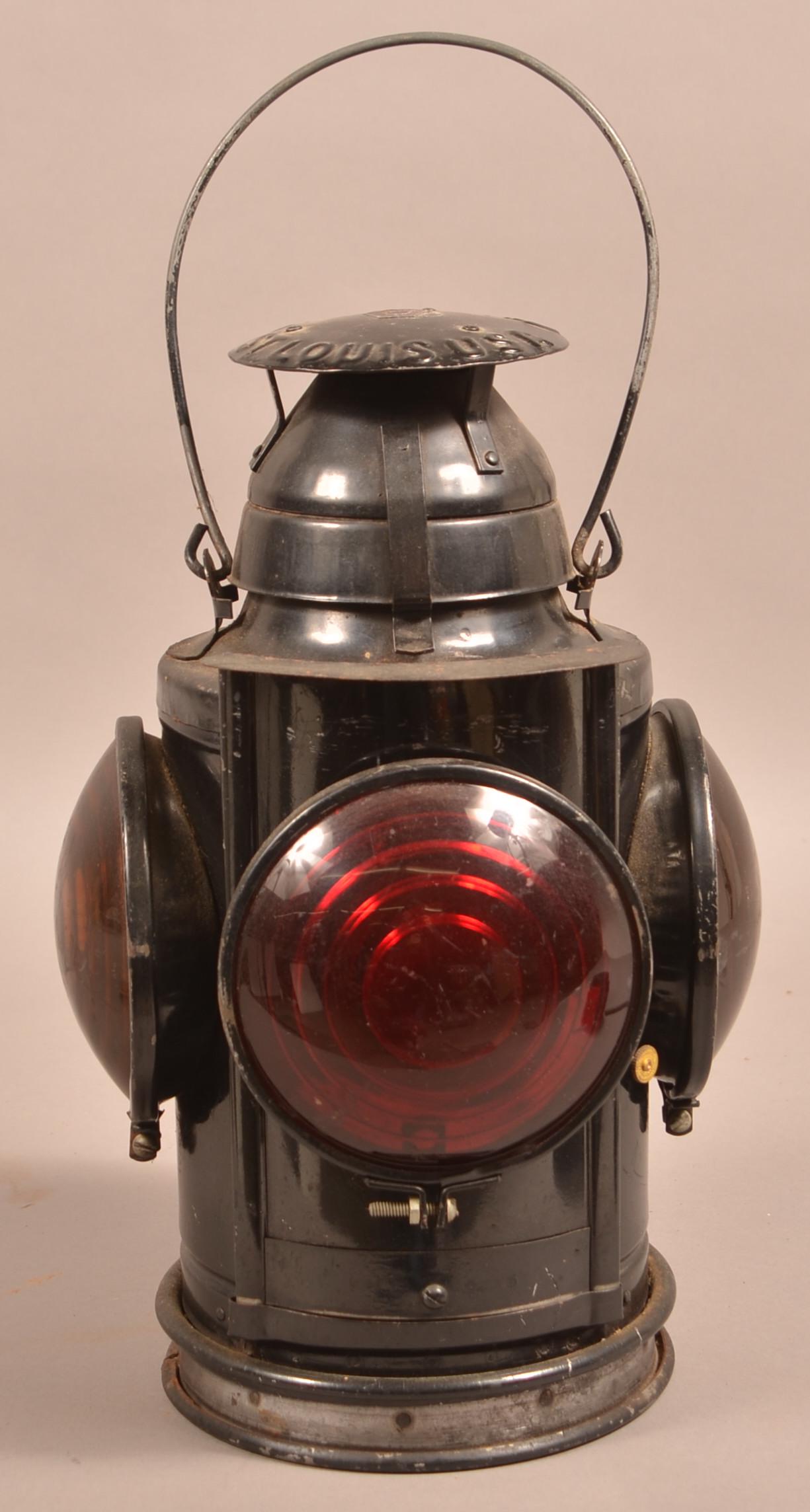 Vintage Handlan PRR Four Way Signal Lantern.: Vintage Handlan PRR Four Way Signal Lantern. Red and yellow lens. 14-1/2"h. Condition: Good with use wear and light rust.