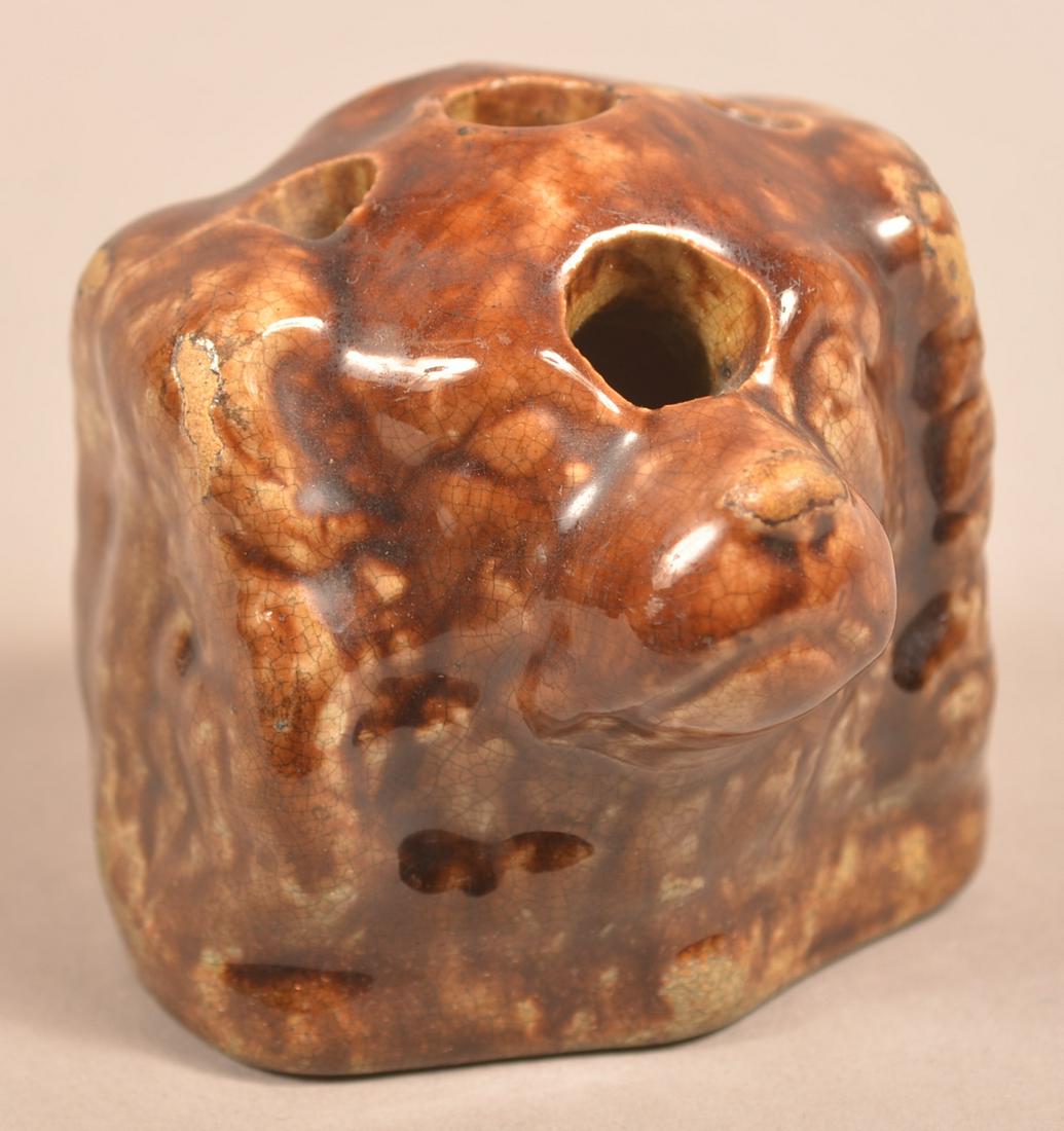 Rockingham Glazed Earthenware Spaniel Head Inkwell.: Rockingham Glazed Earthenware Spaniel Head Inkwell. 19th Century. 3"h. Condition: Very good with minor glaze wear.