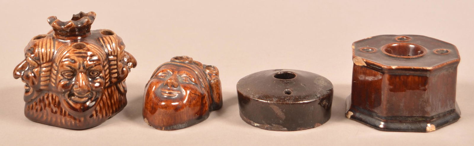 Four 19th Century Pottery Inkwells.: Four 19th Century Pottery Inkwells. Rockingham glazed and redware. Largest measures 3-1/2"h. Condition: Fair to good with chips and wear.