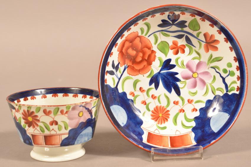 Gaudy Dutch Double Rose Pattern China Cup and Saucer.: Gaudy Dutch Double Rose Pattern Soft Paste China Cup and Saucer. Saucer measures 5-3/4" diam. Condition: Good with glaze wear on edges.