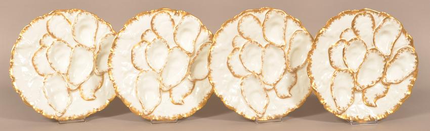 Set of Four Gold Painted Porcelain Oyster Plates.: Set of Four Gold Painted Porcelain Oyster Plates. Green mark for Haviland & Co., Limoges. 8-1/2" diam. Condition: Very Good.