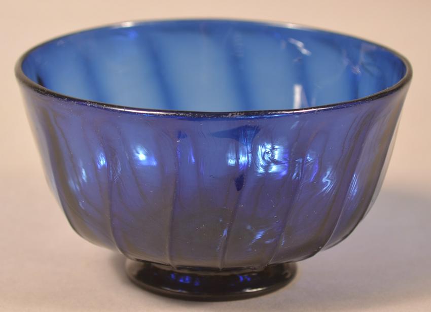 Stiegel Type Blown Cobalt Blue Glass Footed Bowl.: Stiegel-Type Blown Cobalt Blue Glass Footed Bowl. Comet tail pontil. 2-1/2"h. x 4-1/4" diam. Condition: Very good.