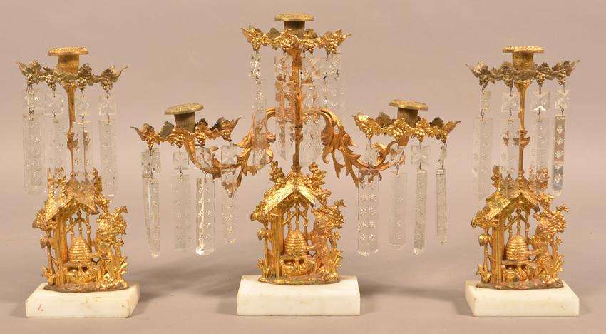 19th Century Bear and Beehive Girandole Garniture Set.: 19th Century Bear and Beehive Girandole Garniture Set. A three piece brass girandole garniture, with bear and beehive figural standards, on marble bases. Nice frosted finish. Largest measures 14-1/2"h
