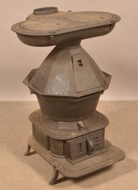 Walker & Pratt Co., Boston No. 1 Cast Iron Stove.: Walker & Pratt Co., Boston No. 1 Cast Iron Stove. With flat iron warmers. 28-1/2"h. Condition: Good.