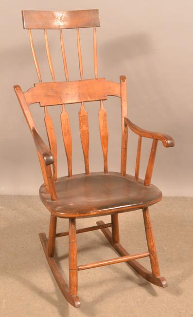 American Comb-Back Windsor Rocking Chair.: American Comb-Back Windsor Rocking Chair. Seat height 17", 43"h. overall. Condition: Good with wear, refinished.