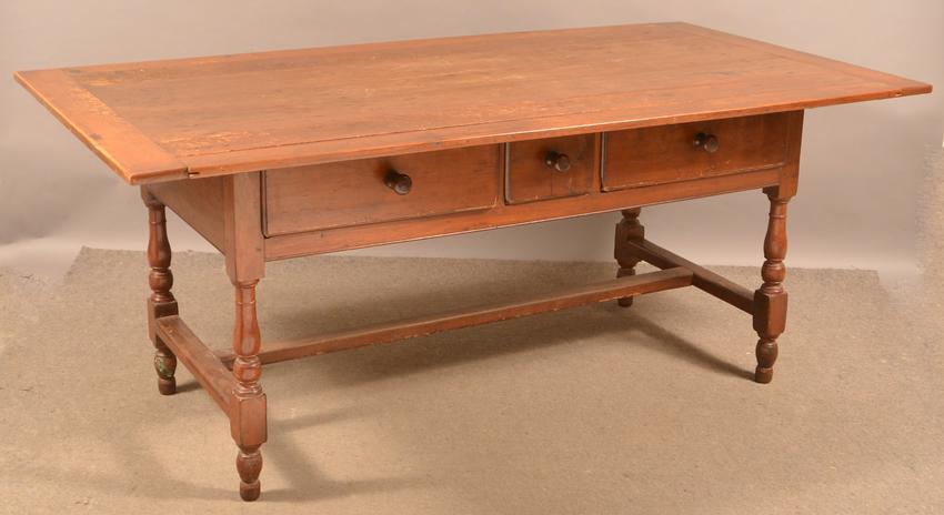 PA Early 19th Century Walnut Stretcher Base Farm Table.: Pennsylvania Early 19th Century Walnut Stretcher Base Farm Table. Later pie board top is softwood. 29-1/2"h. x 72"w. x 37"d. Condition: Good with wear and cracks, top is an old replacement.